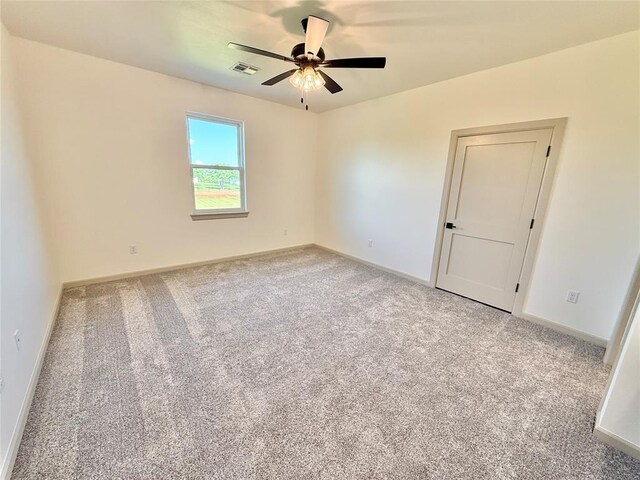 3320 Somerset Farms Rd, Newalla, OK 74857 - carpeted spare room featuring ceiling fan and baseboards