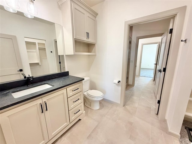 3320 Somerset Farms Rd, Newalla, OK 74857 - bathroom featuring vanity, baseboards, and toilet