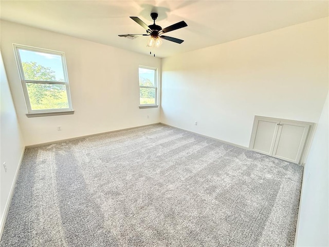 3320 Somerset Farms Rd, Newalla, OK 74857 - empty room with a ceiling fan, carpet, and baseboards