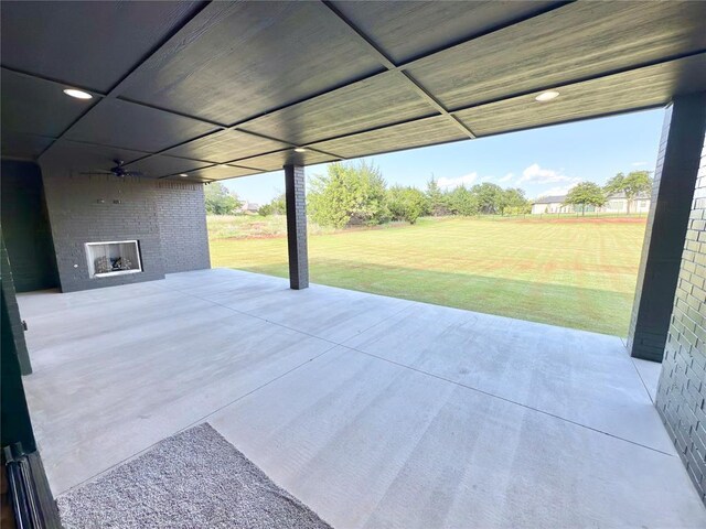 3320 Somerset Farms Rd, Newalla, OK 74857 - view of patio with a large fireplace and a ceiling fan