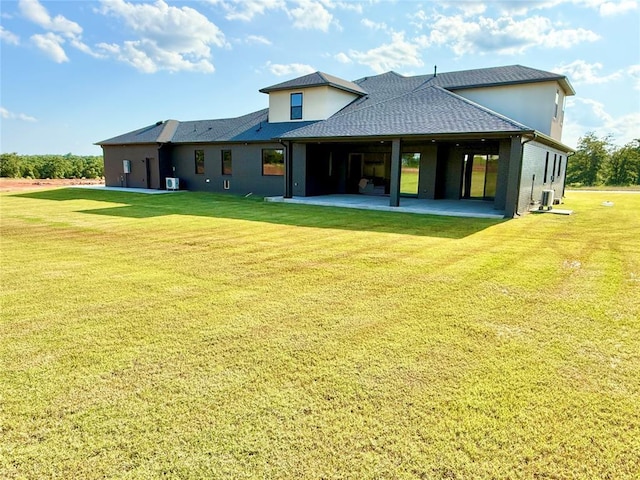 3320 Somerset Farms Rd, Newalla, OK 74857 - rear view of property with a patio area, a lawn, and roof with shingles