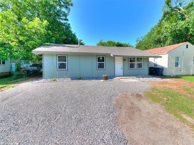 3522 SW 39th St, Oklahoma City, OK 73119 - ranch-style home with roof with shingles and board and batten siding