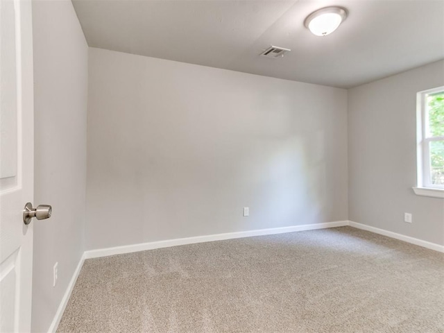 3522 SW 39th St, Oklahoma City, OK 73119 - carpeted empty room featuring baseboards