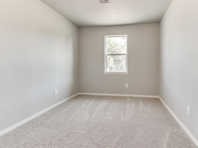 3522 SW 39th St, Oklahoma City, OK 73119 - spare room with carpet flooring and baseboards