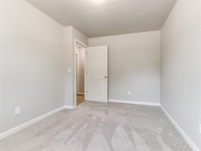 3522 SW 39th St, Oklahoma City, OK 73119 - empty room with carpet flooring and baseboards