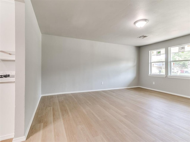 3522 SW 39th St, Oklahoma City, OK 73119 - unfurnished room featuring light wood finished floors and baseboards