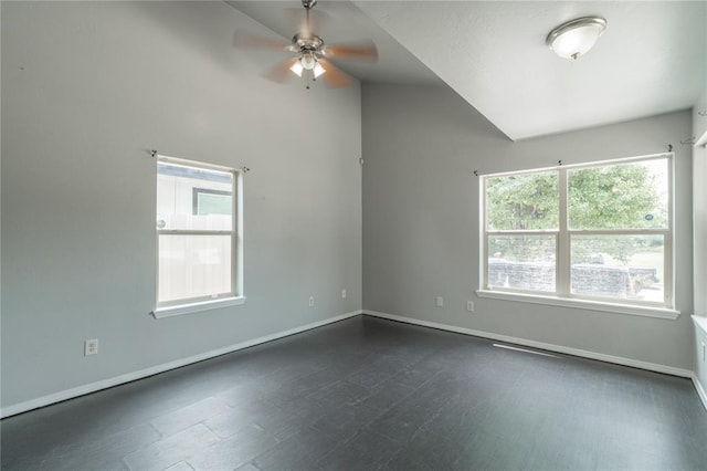 1217 SW 18th St, Oklahoma City, OK 73109 - unfurnished room featuring a ceiling fan, vaulted ceiling, and baseboards