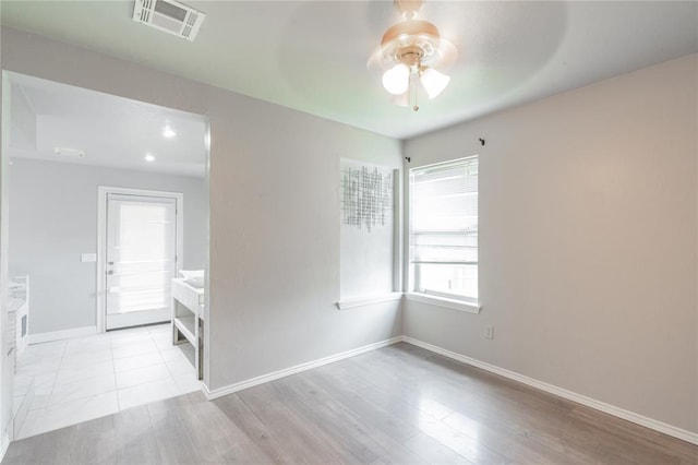 1217 SW 18th St, Oklahoma City, OK 73109 - empty room featuring a ceiling fan, wood finished floors, and baseboards