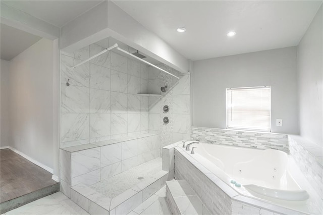 1217 SW 18th St, Oklahoma City, OK 73109 - bathroom featuring a jetted tub, a walk in shower, marble look tile flooring, recessed lighting, and baseboards