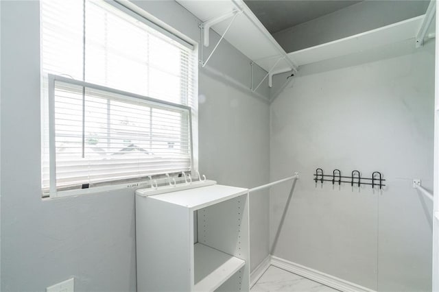 1217 SW 18th St, Oklahoma City, OK 73109 - spacious closet featuring light marble finish flooring
