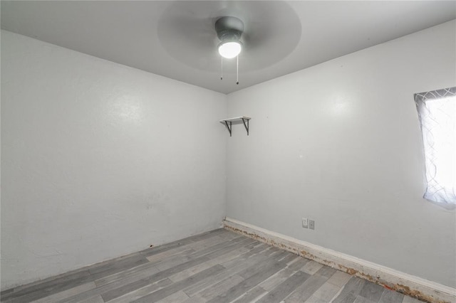 1217 SW 18th St, Oklahoma City, OK 73109 - spare room featuring wood finished floors and a ceiling fan