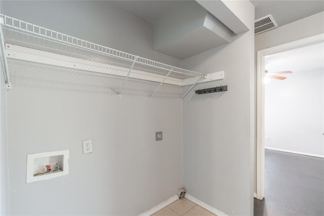 1217 SW 18th St, Oklahoma City, OK 73109 - laundry area featuring washer hookup, electric dryer hookup, baseboards, a ceiling fan, and tile patterned floors