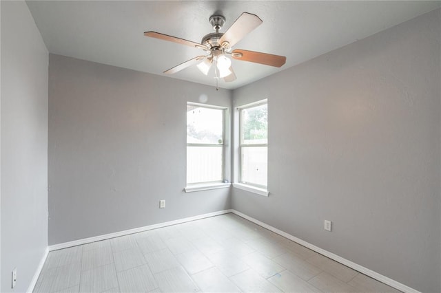 1217 SW 18th St, Oklahoma City, OK 73109 - empty room featuring baseboards and ceiling fan
