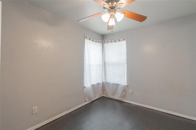 1217 SW 18th St, Oklahoma City, OK 73109 - spare room with baseboards and ceiling fan