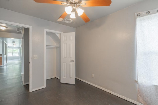 1217 SW 18th St, Oklahoma City, OK 73109 - unfurnished bedroom featuring baseboards, a closet, a ceiling fan, and dark wood-style flooring