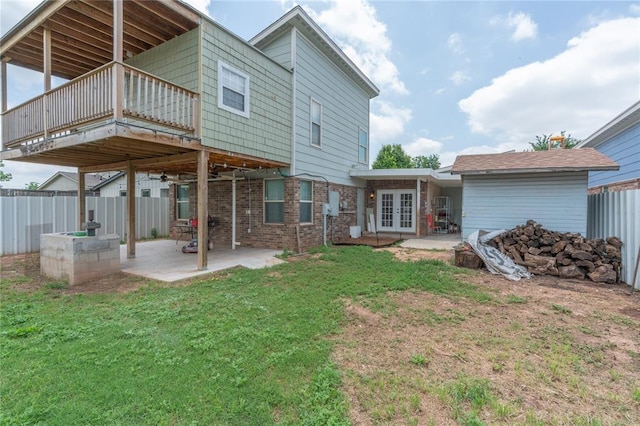 1217 SW 18th St, Oklahoma City, OK 73109 - rear view of property featuring french doors and a patio