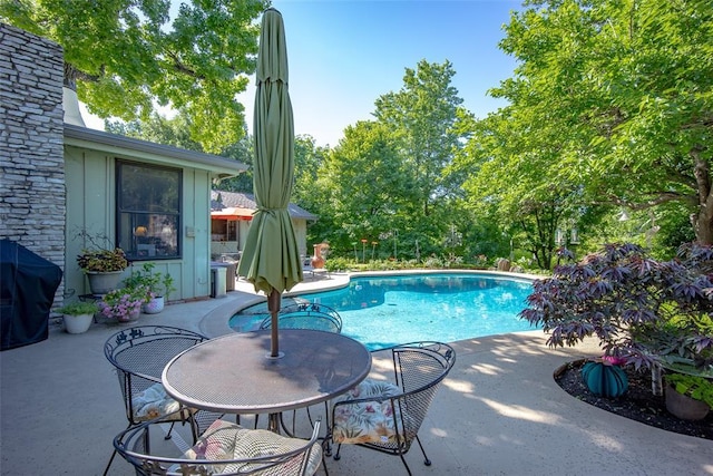 2404 NW 55th Ter, Oklahoma City, OK 73112 - outdoor pool with a patio area
