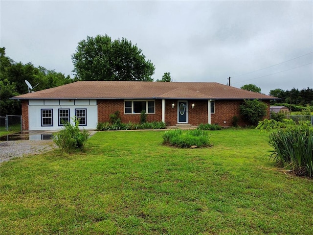 108174 N 3818th Rd, Okemah, OK 74859 - ranch-style house with a front lawn