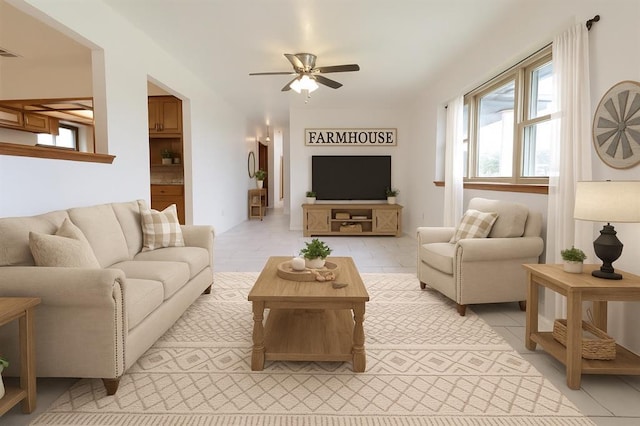 108174 N 3818th Rd, Okemah, OK 74859 - living room featuring ceiling fan and light tile patterned floors