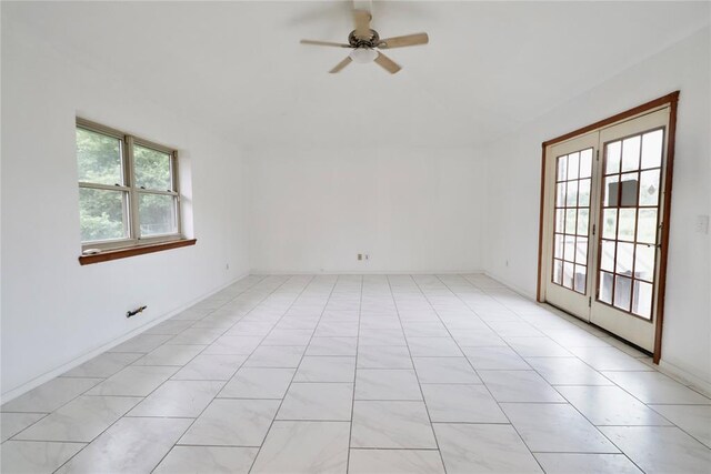 108174 N 3818th Rd, Okemah, OK 74859 - empty room featuring a ceiling fan and lofted ceiling