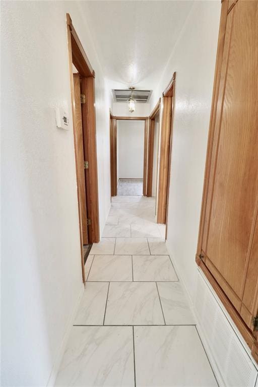 108174 N 3818th Rd, Okemah, OK 74859 - hallway with light marble finish flooring
