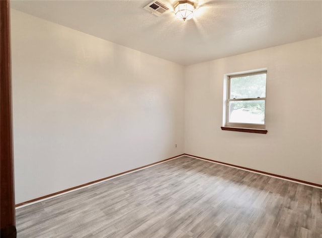 108174 N 3818th Rd, Okemah, OK 74859 - spare room with light wood-type flooring and baseboards
