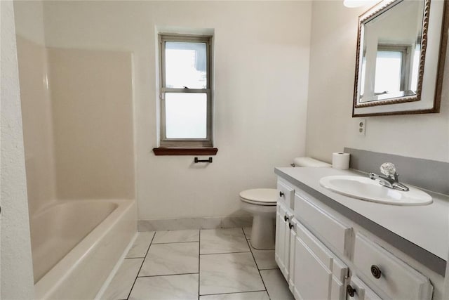 108174 N 3818th Rd, Okemah, OK 74859 - full bathroom featuring vanity, marble finish flooring, toilet, and baseboards