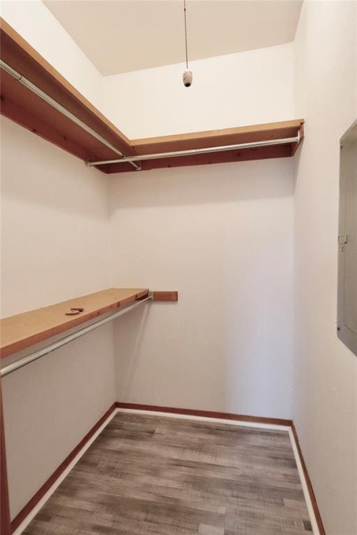 108174 N 3818th Rd, Okemah, OK 74859 - spacious closet with wood finished floors and electric panel