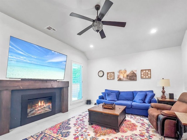 11127 E Sewell Ave, Choctaw, OK 73020 - living area with ceiling fan, vaulted ceiling, recessed lighting, and a fireplace with flush hearth