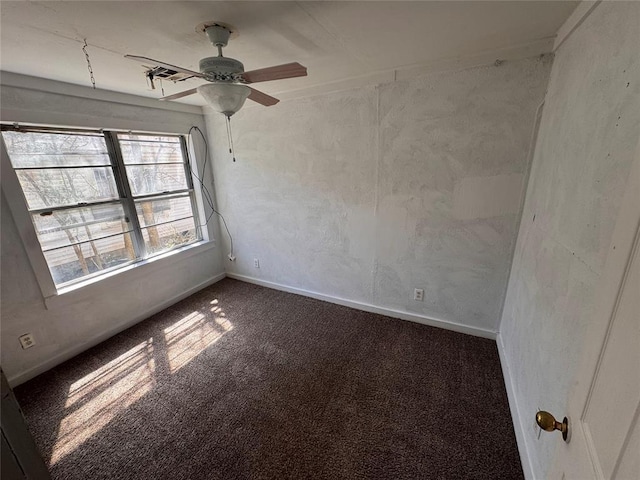 424 Jefferson St, Seminole, OK 74868 - carpeted empty room with a ceiling fan and baseboards