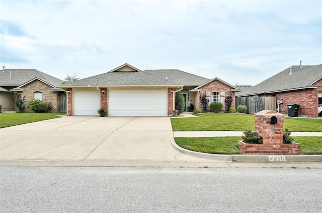 4236 Notting Hill Dr, Moore, OK 73160 - ranch-style house with an attached garage, concrete driveway, brick siding, and roof with shingles