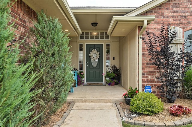 4236 Notting Hill Dr, Moore, OK 73160 - doorway to property featuring brick siding