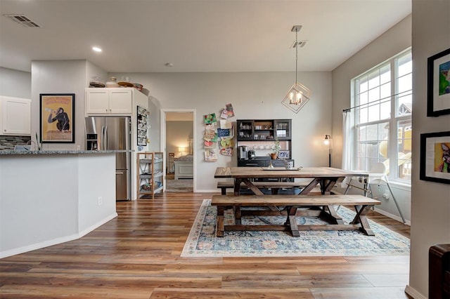 4236 Notting Hill Dr, Moore, OK 73160 - dining room with light wood-style floors, baseboards, recessed lighting, and a chandelier
