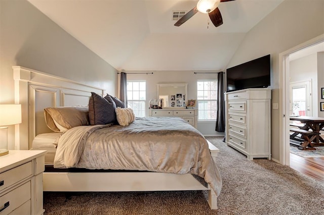 4236 Notting Hill Dr, Moore, OK 73160 - bedroom with vaulted ceiling, carpet flooring, and ceiling fan
