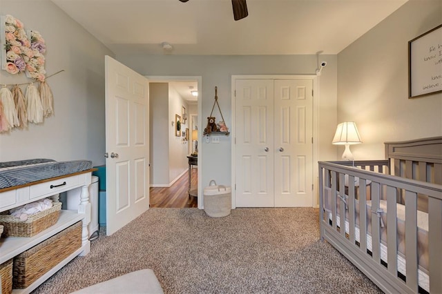 4236 Notting Hill Dr, Moore, OK 73160 - carpeted bedroom featuring a closet, a ceiling fan, and a crib