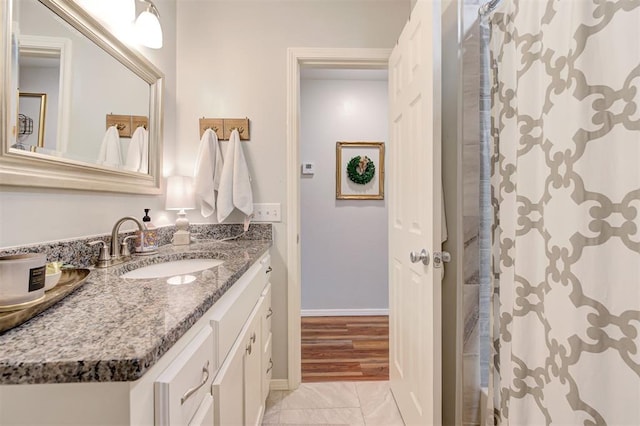 4236 Notting Hill Dr, Moore, OK 73160 - full bath with vanity, a shower with curtain, tile patterned flooring, and baseboards