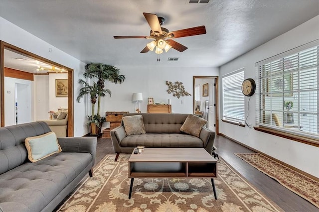 912 SW 4th Pl, Moore, OK 73160 - living room with ceiling fan, wood finished floors, and baseboards