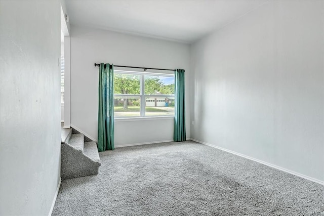 615 Ridgecrest Rd, Edmond, OK 73013 - unfurnished room with carpet flooring, stairs, and baseboards