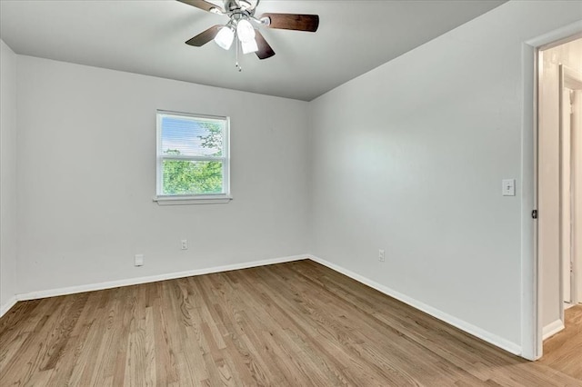 615 Ridgecrest Rd, Edmond, OK 73013 - empty room with wood finished floors, baseboards, and a ceiling fan
