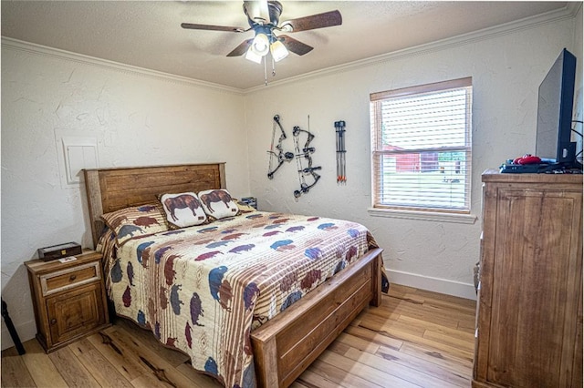 106049 N 3855-1 Rd, Weleetka, OK 74880 - bedroom featuring light wood-style flooring, crown molding, baseboards, ceiling fan, and a textured wall