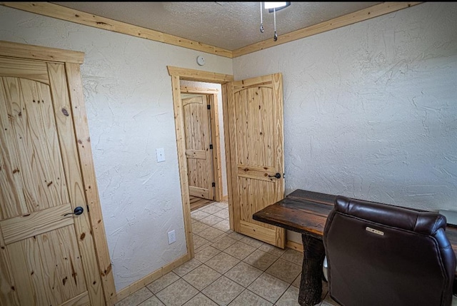106049 N 3855-1 Rd, Weleetka, OK 74880 - home office featuring light tile patterned floors, a textured wall, and baseboards