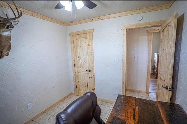 106049 N 3855-1 Rd, Weleetka, OK 74880 - tiled office featuring ceiling fan, baseboards, a textured ceiling, and a textured wall