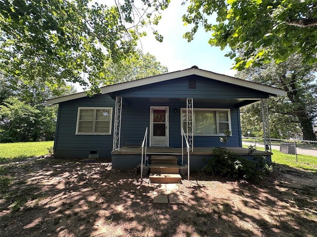 811 N Broadway St, Broken Bow, OK 74728 - bungalow featuring a porch and crawl space