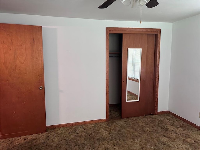 811 N Broadway St, Broken Bow, OK 74728 - unfurnished bedroom with a closet, carpet flooring, baseboards, and a ceiling fan