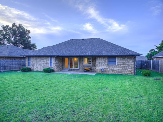 1320 Von Elm Pl, Yukon, OK 73099 - rear view of property with roof with shingles, a patio area, and brick siding