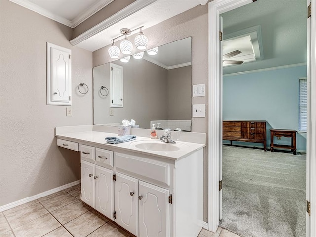1320 Von Elm Pl, Yukon, OK 73099 - bathroom featuring ornamental molding, vanity, baseboards, and tile patterned flooring