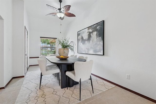 709 S Greengate Dr, Yukon, OK 73099 - dining space with a ceiling fan, light tile patterned floors, and vaulted ceiling