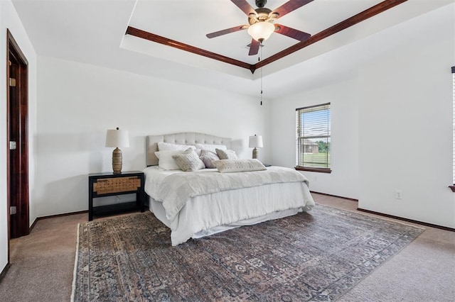 709 S Greengate Dr, Yukon, OK 73099 - bedroom with a raised ceiling, carpet floors, crown molding, and ceiling fan