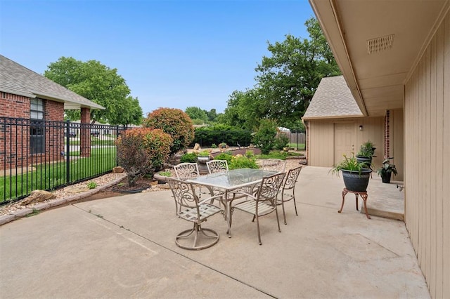 709 S Greengate Dr, Yukon, OK 73099 - view of patio / terrace featuring outdoor dining area