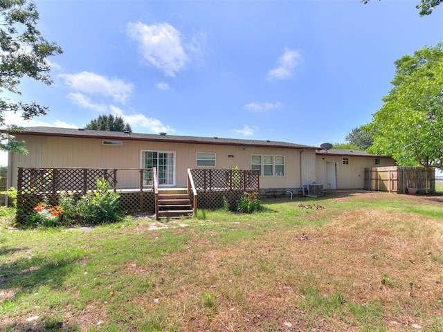 12325 Spring Meadows Rd, Yukon, OK 73099 - rear view of house featuring a wooden deck